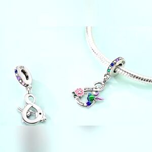 925 Sterling Silvery Hummingbird And Infinity Charm with Pink and Purple Accents